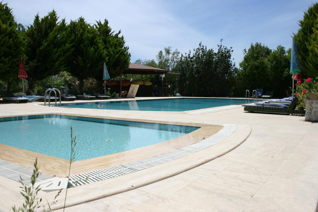 Paradise Garden Gumusluk Evleri Aparthotel Esterno foto
