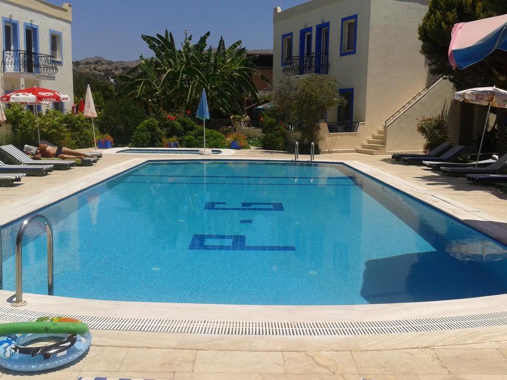 Paradise Garden Gumusluk Evleri Aparthotel Esterno foto