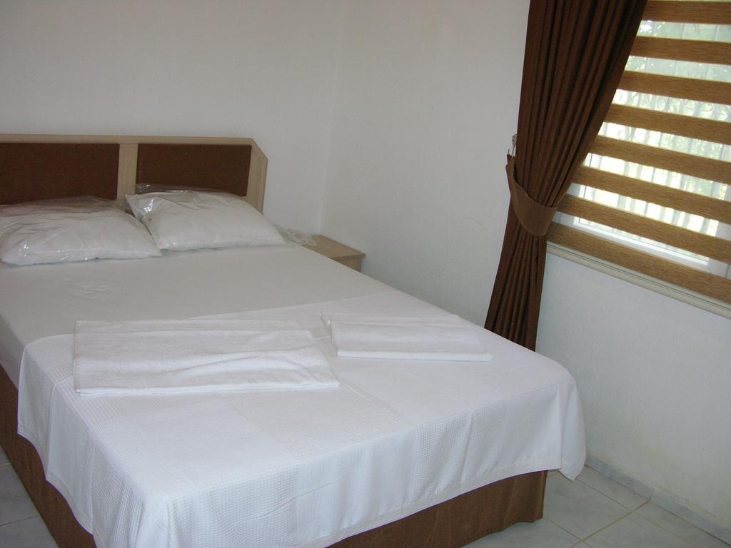 Paradise Garden Gumusluk Evleri Aparthotel Esterno foto