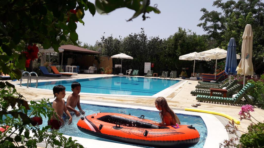 Paradise Garden Gumusluk Evleri Aparthotel Esterno foto