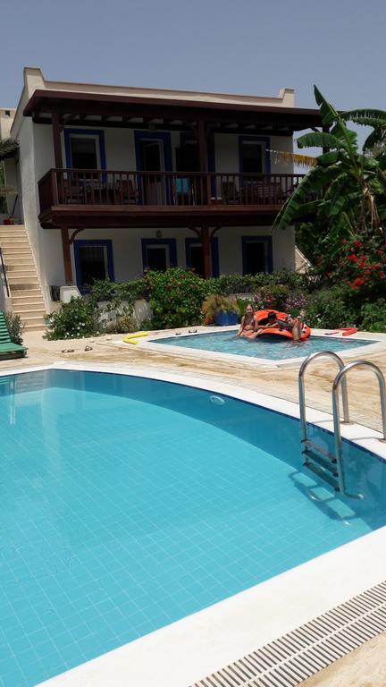 Paradise Garden Gumusluk Evleri Aparthotel Esterno foto