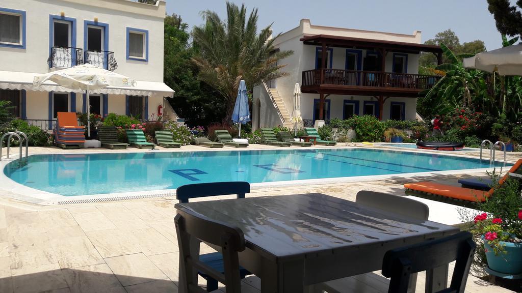 Paradise Garden Gumusluk Evleri Aparthotel Esterno foto