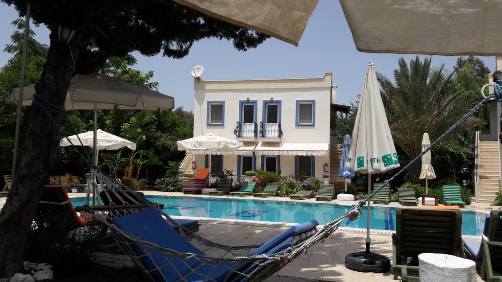 Paradise Garden Gumusluk Evleri Aparthotel Esterno foto
